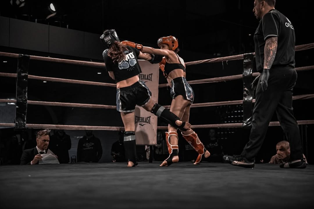 Ana Arvan landing a cross in the ring